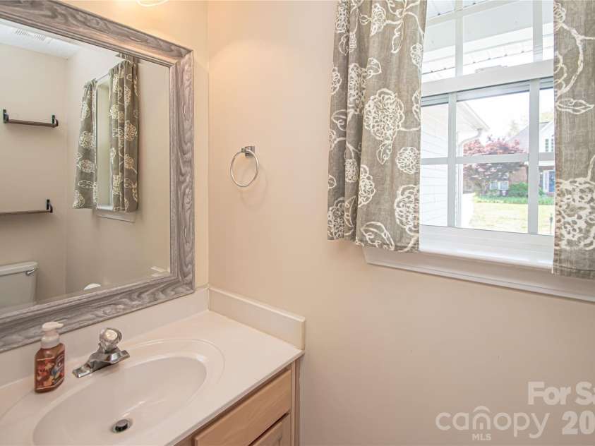 4708 Titus Court, Monroe, NC 28110.  MLS# CAR4371611, YatesRealty ID 24524. Half bath on main level!
