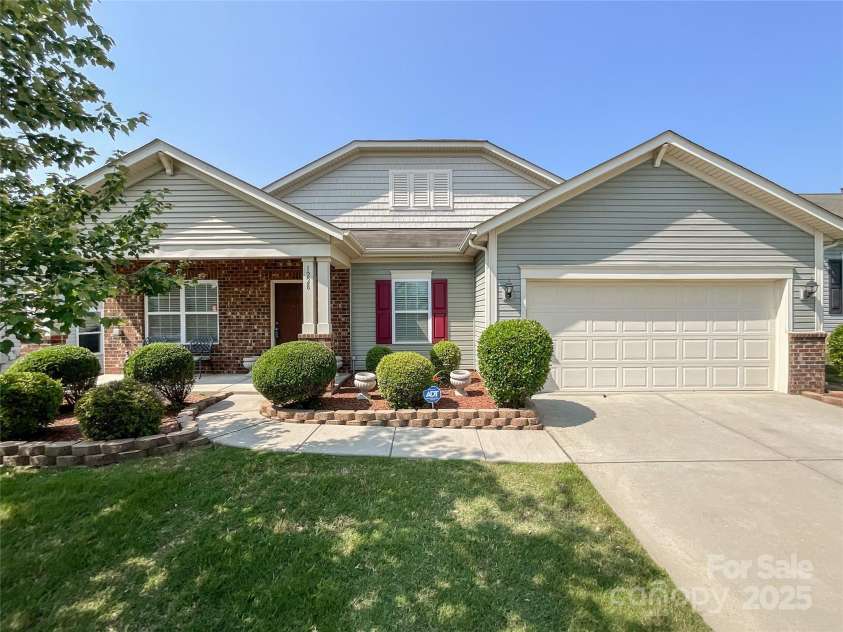 1228 Tranquil Falls Lane, Matthews, NC 28104.  MLS# CAR4265694, YatesRealty ID 24525. 