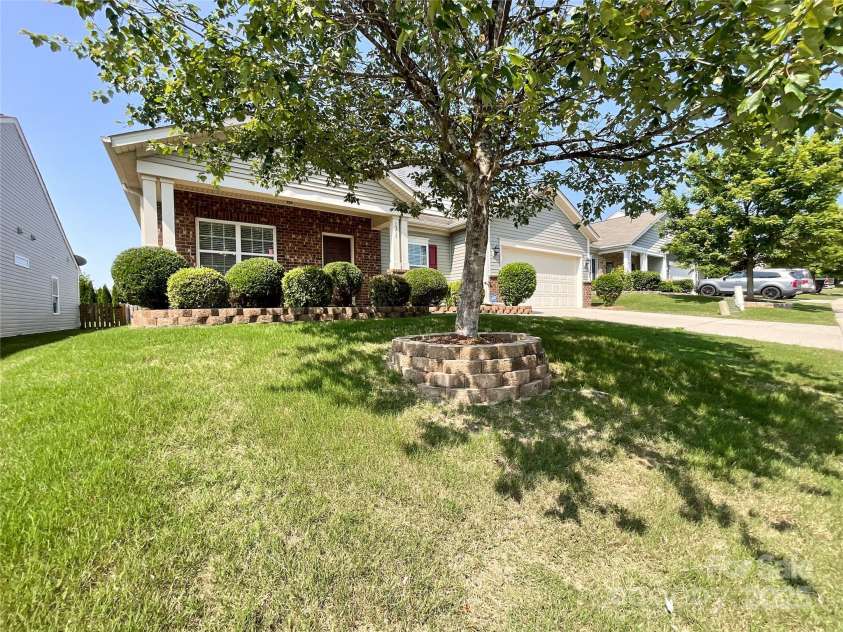 1228 Tranquil Falls Lane, Matthews, NC 28104.  MLS# CAR4265694, YatesRealty ID 24525. 