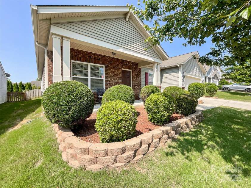 1228 Tranquil Falls Lane, Matthews, NC 28104.  MLS# CAR4265694, YatesRealty ID 24525. 