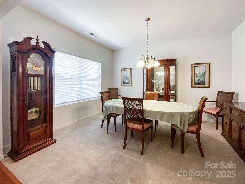 1228 Tranquil Falls Lane, Matthews, NC 28104.  MLS# CAR4265694, YatesRealty ID 24525. 