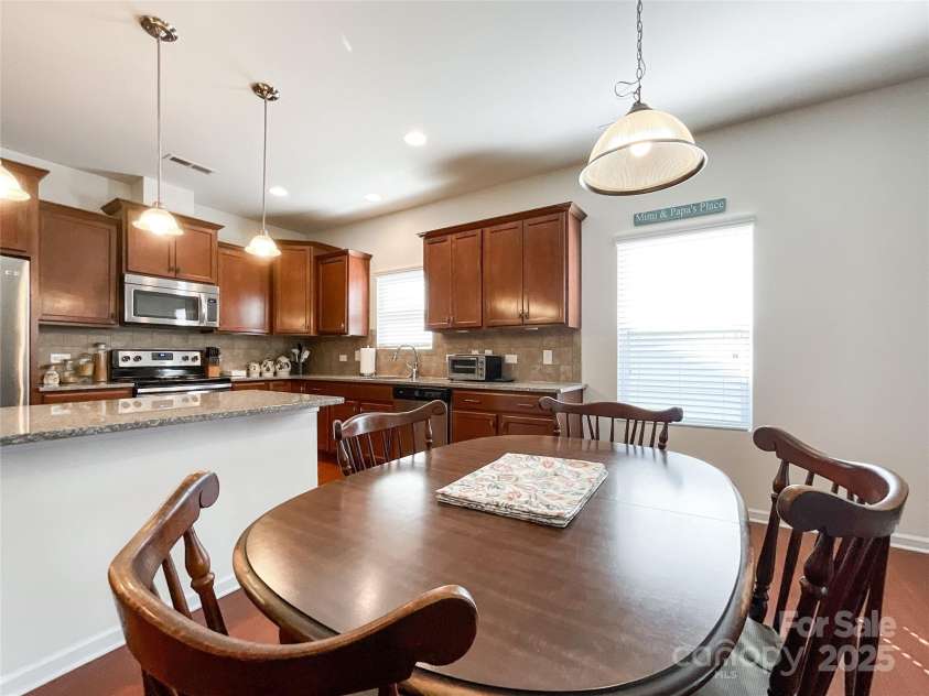 1228 Tranquil Falls Lane, Matthews, NC 28104.  MLS# CAR4265694, YatesRealty ID 24525. 