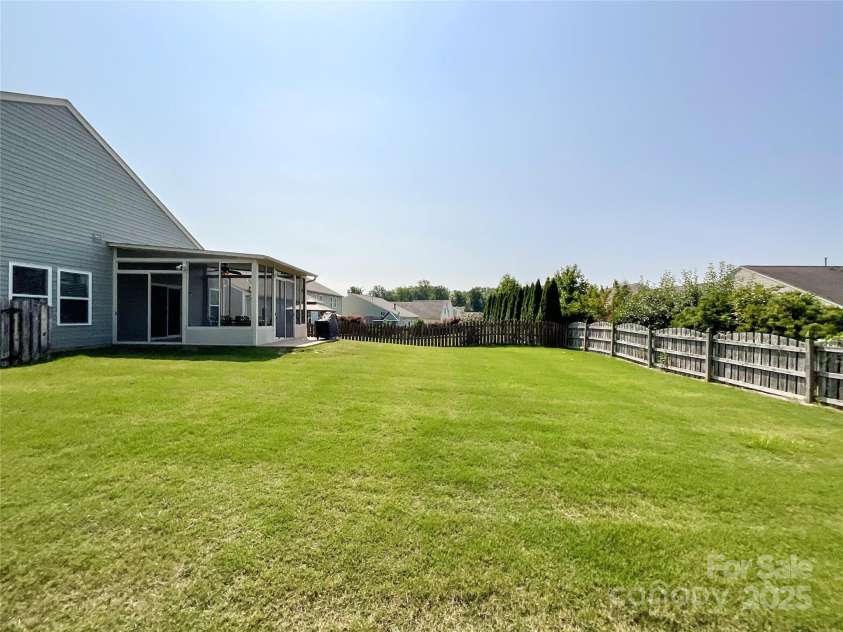 1228 Tranquil Falls Lane, Matthews, NC 28104.  MLS# CAR4265694, YatesRealty ID 24525. 