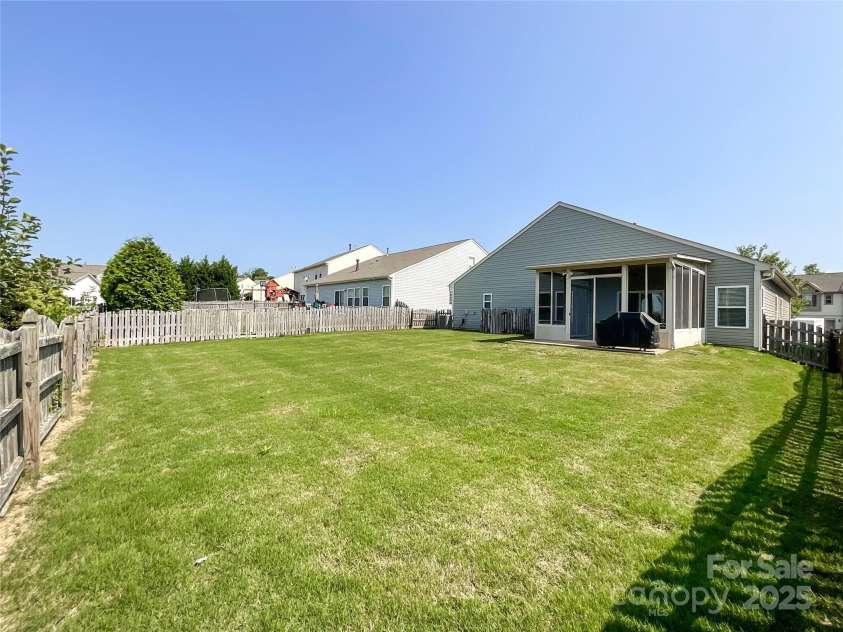 1228 Tranquil Falls Lane, Matthews, NC 28104.  MLS# CAR4265694, YatesRealty ID 24525. 