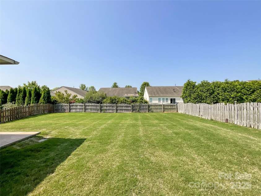 1228 Tranquil Falls Lane, Matthews, NC 28104.  MLS# CAR4265694, YatesRealty ID 24525. 