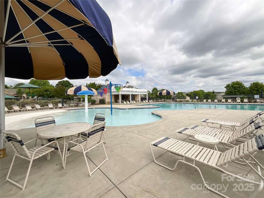 1228 Tranquil Falls Lane, Matthews, NC 28104.  MLS# CAR4265694, YatesRealty ID 24525. 