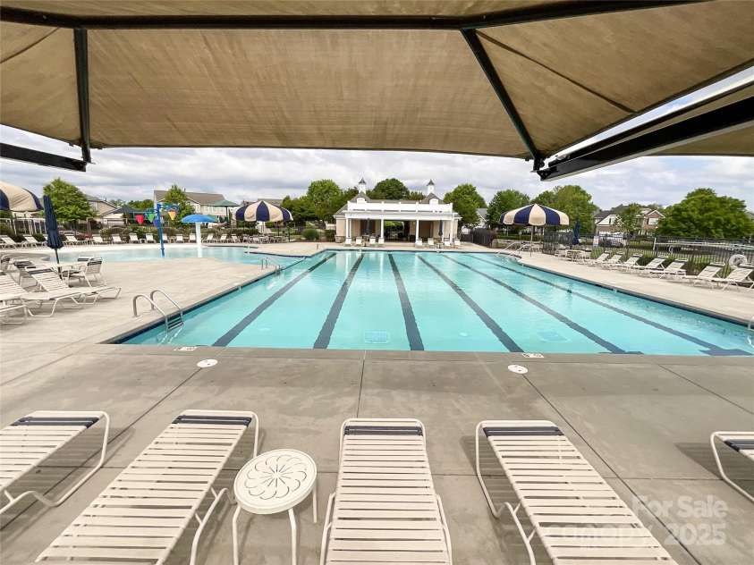 1228 Tranquil Falls Lane, Matthews, NC 28104.  MLS# CAR4265694, YatesRealty ID 24525. 