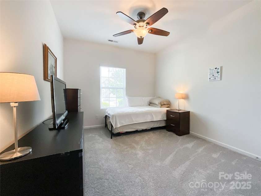 1228 Tranquil Falls Lane, Matthews, NC 28104.  MLS# CAR4265694, YatesRealty ID 24525. Bedroom 2