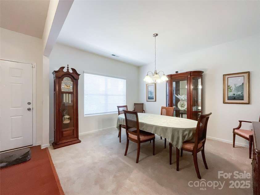 1228 Tranquil Falls Lane, Matthews, NC 28104.  MLS# CAR4265694, YatesRealty ID 24525. Dinning Room