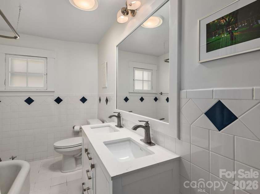 67 Cherokee Road, Asheville, NC 28801.  MLS# CAR4339931, YatesRealty ID 24525. Guest Bath With New Double Vanity