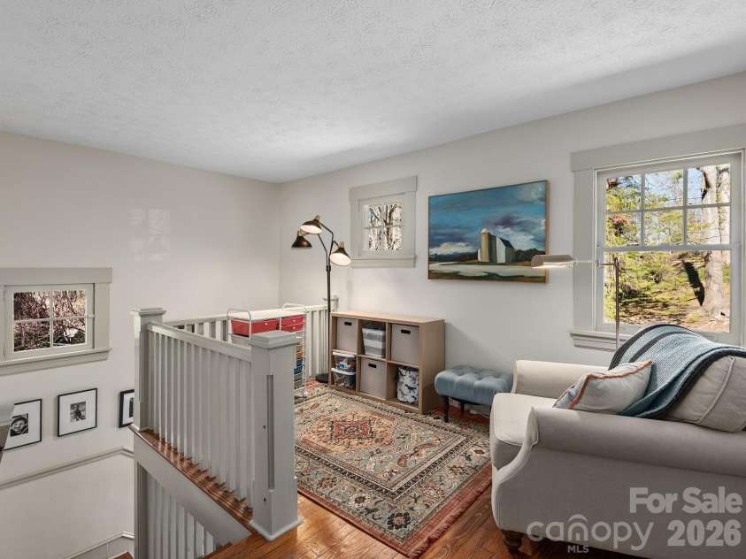 67 Cherokee Road, Asheville, NC 28801.  MLS# CAR4339931, YatesRealty ID 24525. Upper Level Serene Reading Space