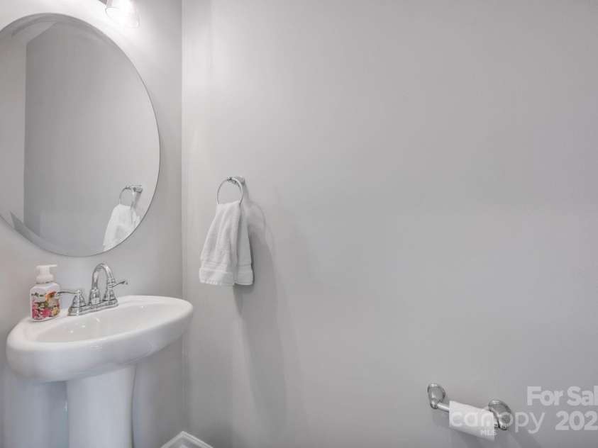 1315 Elizabeth Avenue, Kannapolis, NC 28083.  MLS# CAR4268993, YatesRealty ID 24527. Downstairs half bath