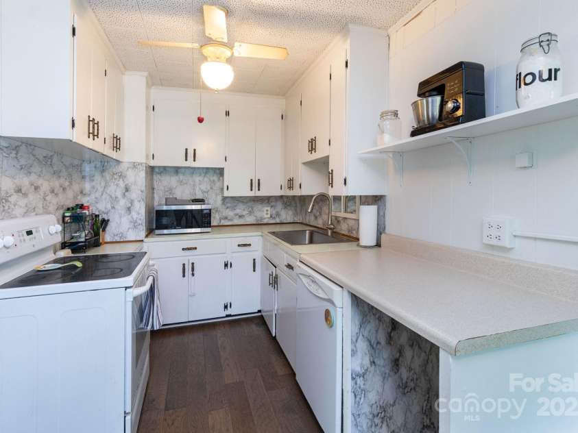 15 Gaddy Road, Weaverville, NC 28787.  MLS# CAR4260731, YatesRealty ID 24529. Galley Kitchen