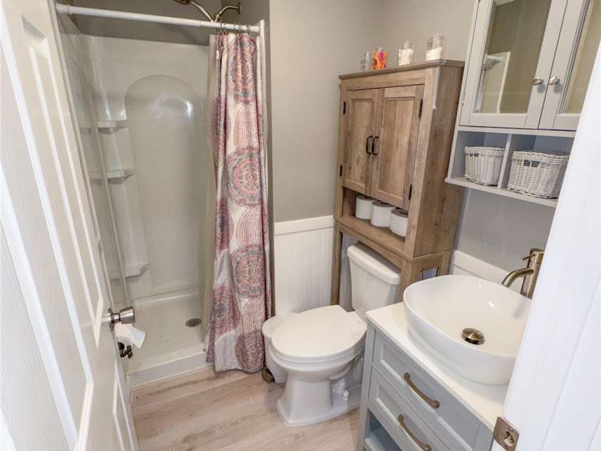 368 Gaddy Farm Road, Mount Gilead, NC 27306.  MLS# CAR4296067, YatesRealty ID 2453. Downstairs Bathroom
