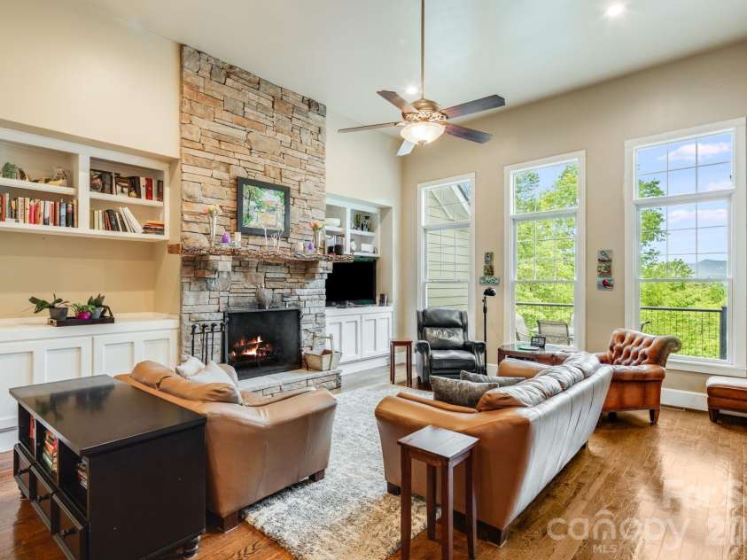 1659 High Rock Acres Drive, Black Mountain, NC 28711.  MLS# CAR4380378, YatesRealty ID 24534. Built-In Storage Surrounding Fireplace