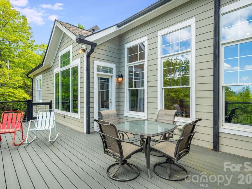 1659 High Rock Acres Drive, Black Mountain, NC 28711.  MLS# CAR4380378, YatesRealty ID 24534. Living Room Overlooking  Deck 