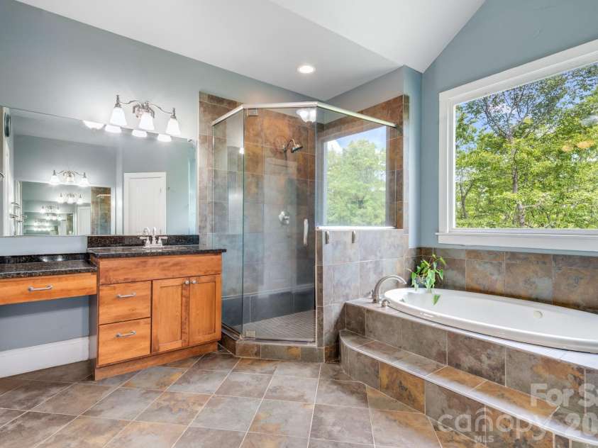 1659 High Rock Acres Drive, Black Mountain, NC 28711.  MLS# CAR4380378, YatesRealty ID 24534. Shower in Primary Bath 