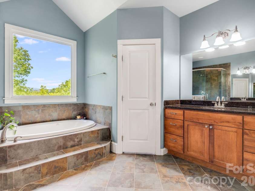 1659 High Rock Acres Drive, Black Mountain, NC 28711.  MLS# CAR4380378, YatesRealty ID 24534. Spa Like Bathroom 