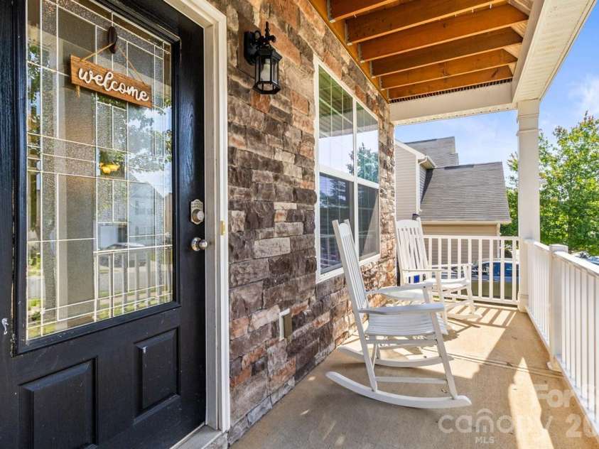 151 Millen Drive, Mooresville, NC 28115.  MLS# CAR4382866, YatesRealty ID 24537. Cozy front porch