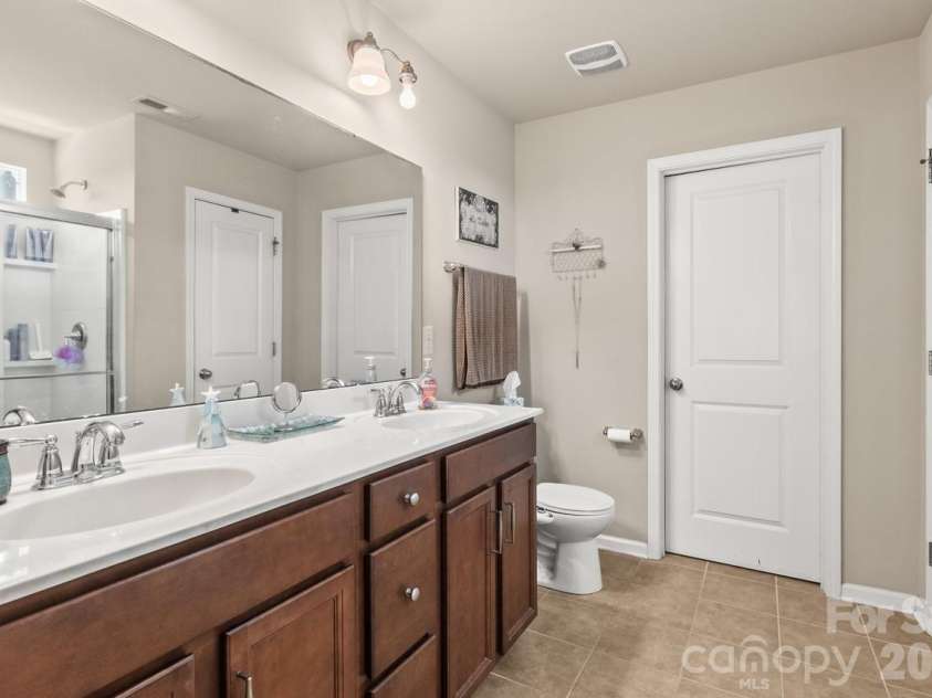 151 Millen Drive, Mooresville, NC 28115.  MLS# CAR4382866, YatesRealty ID 24537. Primary bathroom