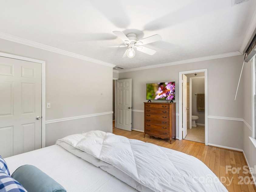 203 Davis Mountain Road, Laurel Park, NC 28739.  MLS# CAR4237042, YatesRealty ID 24540. Primary suite, wood floors