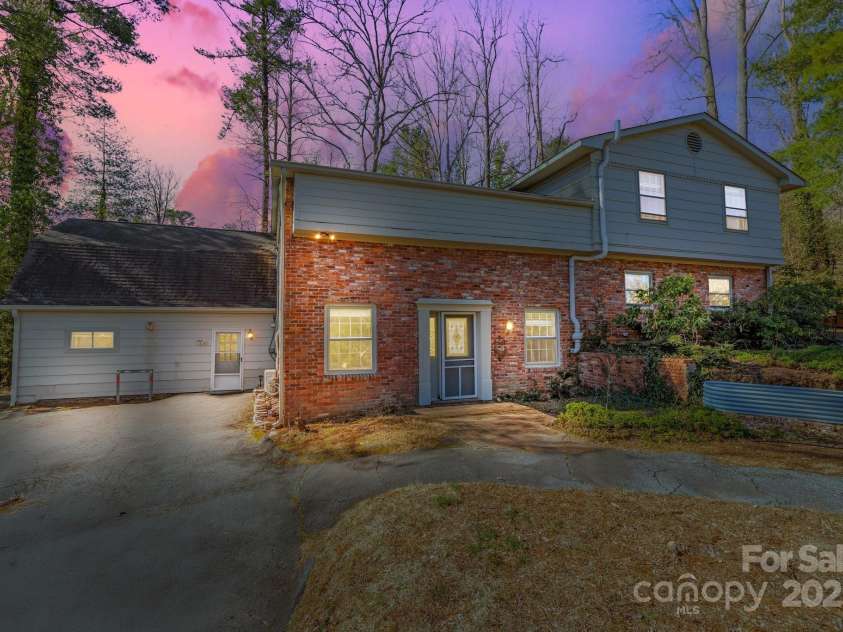203 Davis Mountain Road, Laurel Park, NC 28739.  MLS# CAR4237042, YatesRealty ID 24540. Welcome Home (virtual twilight)