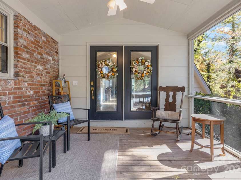 203 Davis Mountain Road, Laurel Park, NC 28739.  MLS# CAR4332728, YatesRealty ID 24540. Airy screened porch