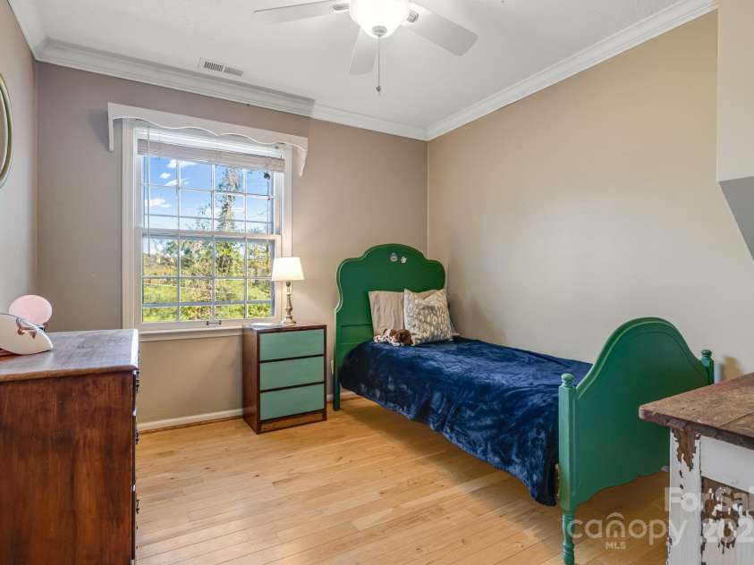 203 Davis Mountain Road, Laurel Park, NC 28739.  MLS# CAR4332728, YatesRealty ID 24540. Bright interior spaces, secondary bedroom 