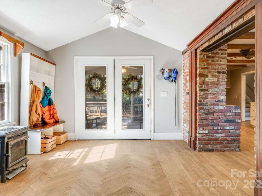 203 Davis Mountain Road, Laurel Park, NC 28739.  MLS# CAR4332728, YatesRealty ID 24540. Custom herringbone hardwood floor entry, bright interior 