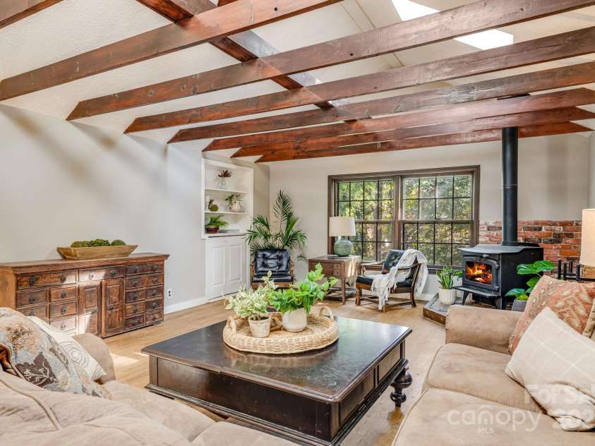 203 Davis Mountain Road, Laurel Park, NC 28739.  MLS# CAR4332728, YatesRealty ID 24540. Hardwood floors, beamed ceilings, spacious living space