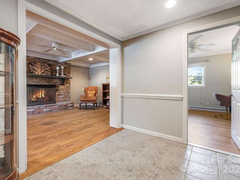 203 Davis Mountain Road, Laurel Park, NC 28739.  MLS# CAR4332728, YatesRealty ID 24540. Lower level with Den and Secondary Bedroom with Ensuite Bathroom