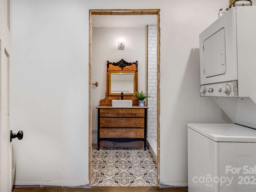 203 Davis Mountain Road, Laurel Park, NC 28739.  MLS# CAR4332728, YatesRealty ID 24540. Second laundry and remodeled bathroom