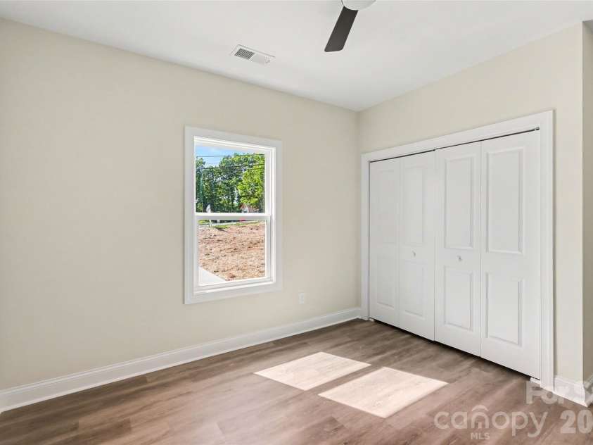 1452 Robinwood Road, Gastonia, NC 28054.  MLS# CAR4366312, YatesRealty ID 24545. Bedroom 3 with full bath