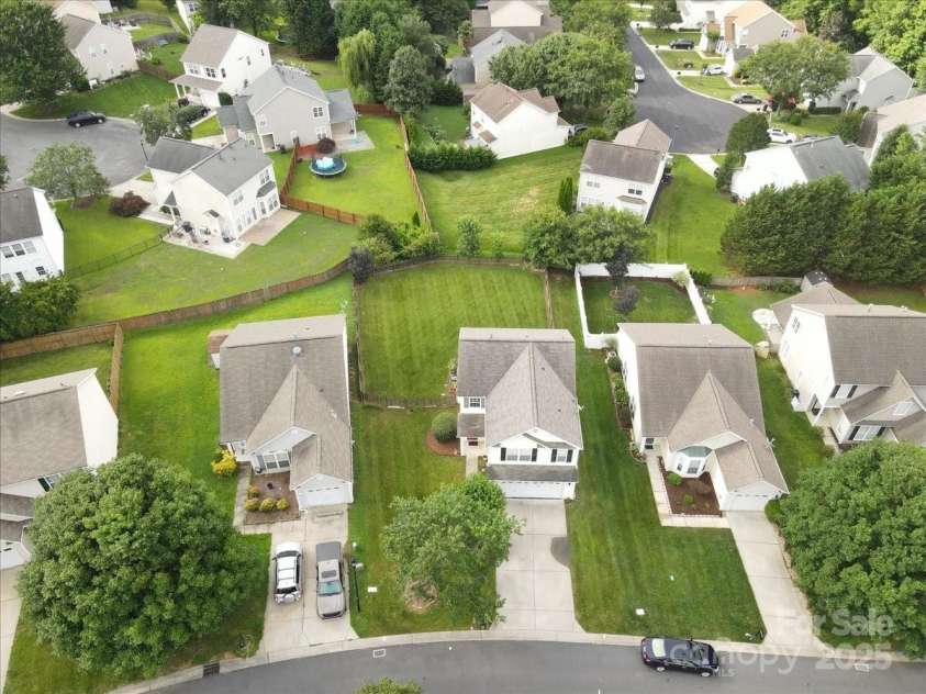 2527 Fossil Stone Lane, Fort Mill, SC 29708.  MLS# CAR4271300, YatesRealty ID 24545. Aero view of the neighborhood