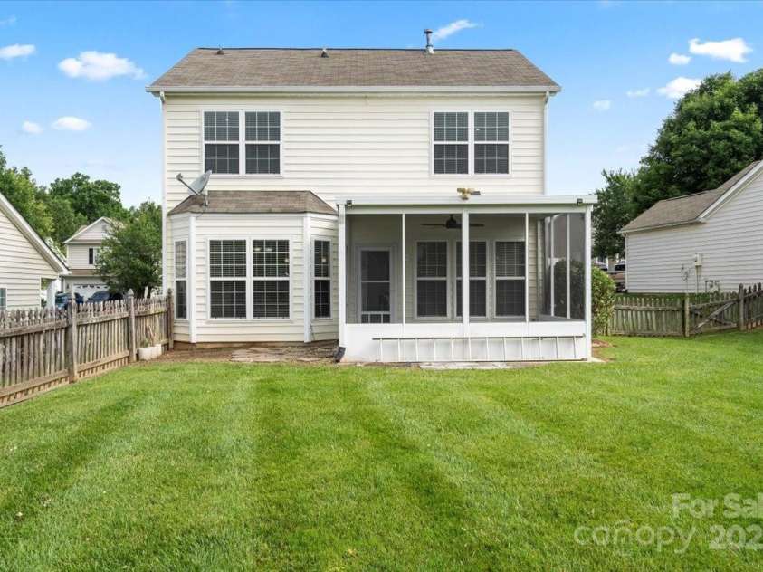 2527 Fossil Stone Lane, Fort Mill, SC 29708.  MLS# CAR4271300, YatesRealty ID 24545. Back of the home