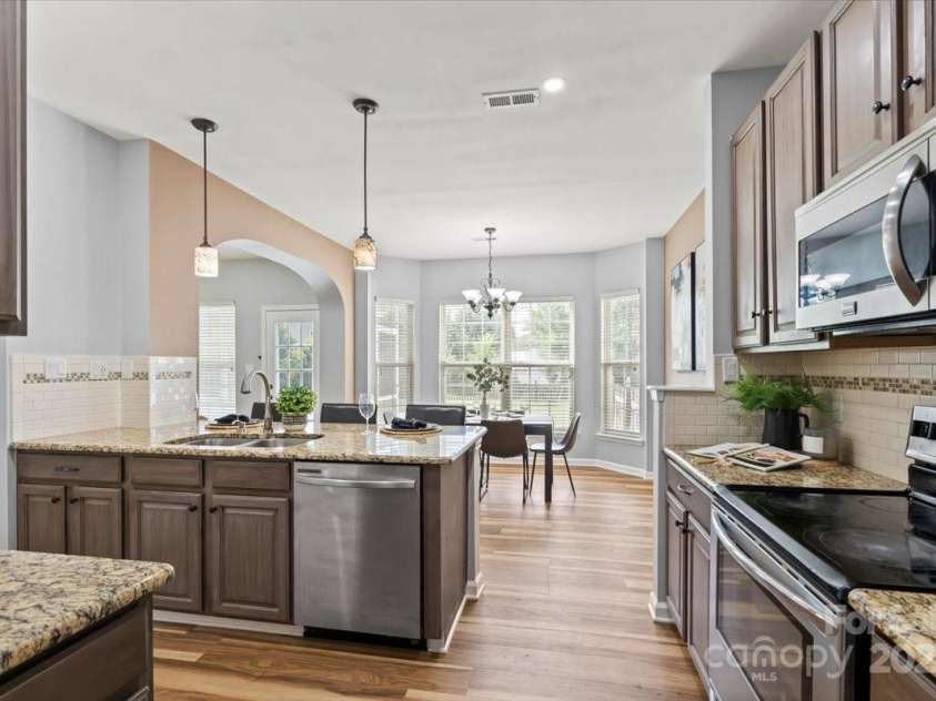 2527 Fossil Stone Lane, Fort Mill, SC 29708.  MLS# CAR4271300, YatesRealty ID 24545. Open floor plan for modern living