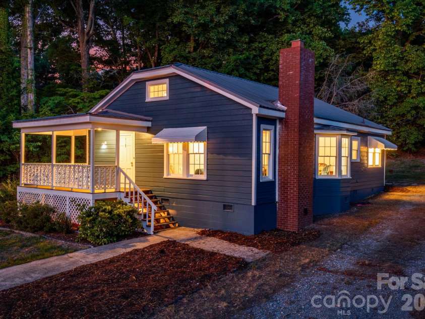 141 Coxe Road, Rutherfordton, NC 28139.  MLS# CAR4383067, YatesRealty ID 24548. Front View - Virtual Twilight