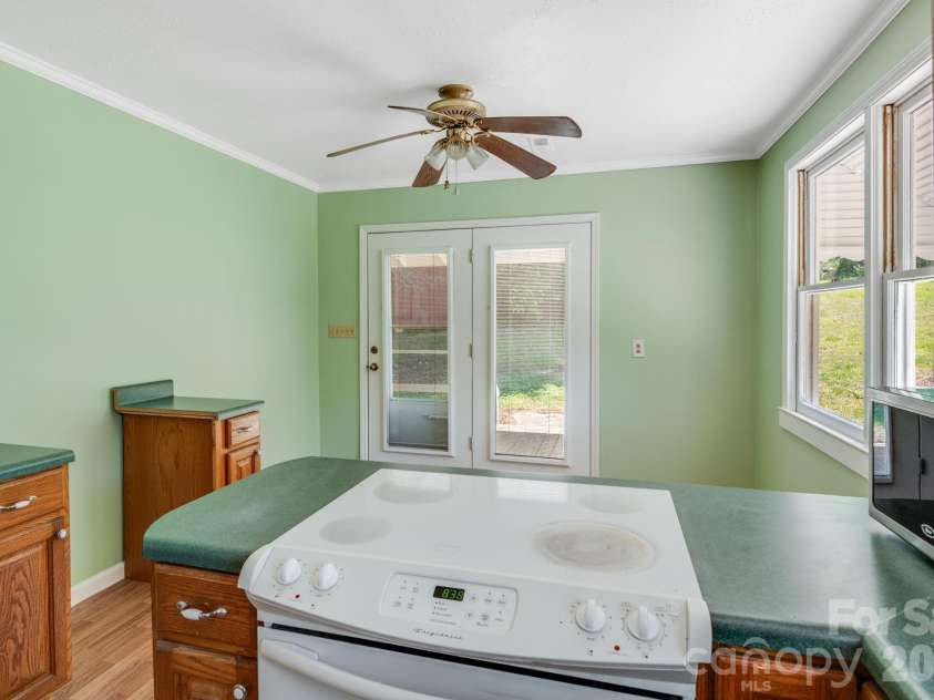 141 Coxe Road, Rutherfordton, NC 28139.  MLS# CAR4383067, YatesRealty ID 24548. Kitchen - View to Back Porch