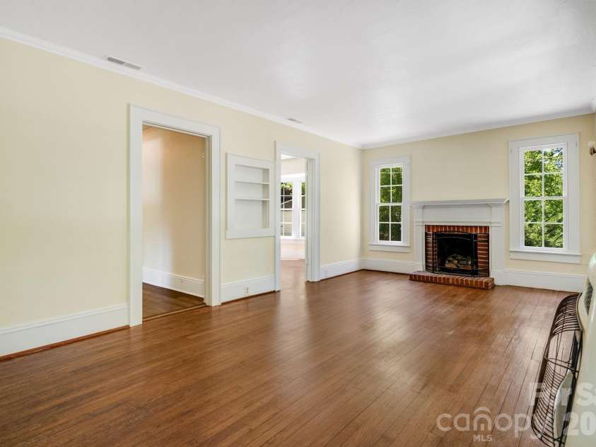 141 Coxe Road, Rutherfordton, NC 28139.  MLS# CAR4383067, YatesRealty ID 24548. Living Area - Side View with Chimney