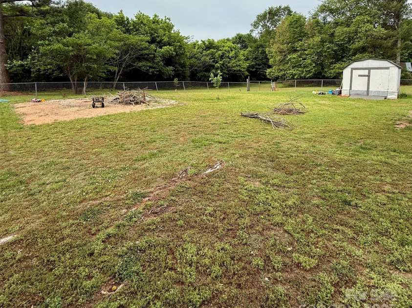 214 Double Shoals Road, Lawndale, NC 28090.  MLS# CAR4256264, YatesRealty ID 24548. Back yard