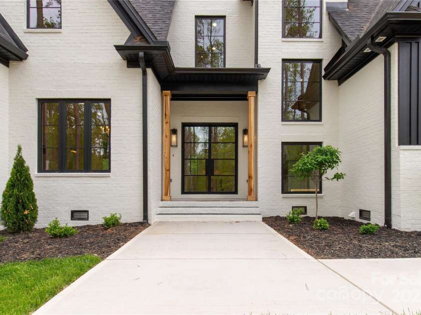 3268 Sherman Drive, Lancaster, SC 29720.  MLS# CAR4244022, YatesRealty ID 24562. Custom front door and poplar pillars made from trees on the lot