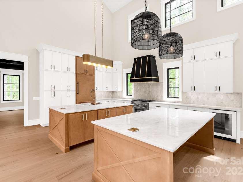 3268 Sherman Drive, Lancaster, SC 29720.  MLS# CAR4244022, YatesRealty ID 24562. Gourmet kitchen with Thermador appliances and 2 large islands