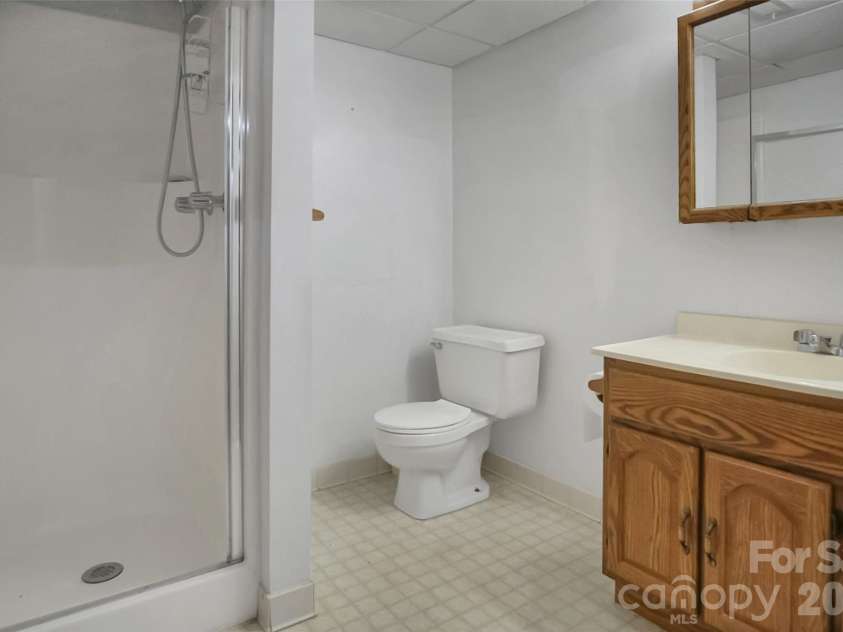 3021 Davis Park Road, Gastonia, NC 28052.  MLS# CAR4380027, YatesRealty ID 24563. Basement bathroom