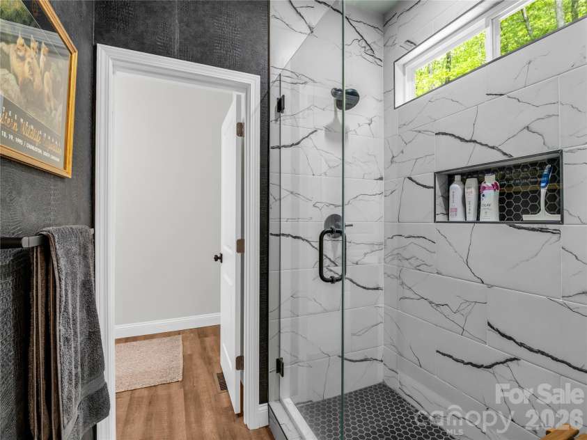 737 Melrose Mountain Road, Tryon, NC 28782.  MLS# CAR4380872, YatesRealty ID 24564. Jack N Jill Bath with Walk-in Shower