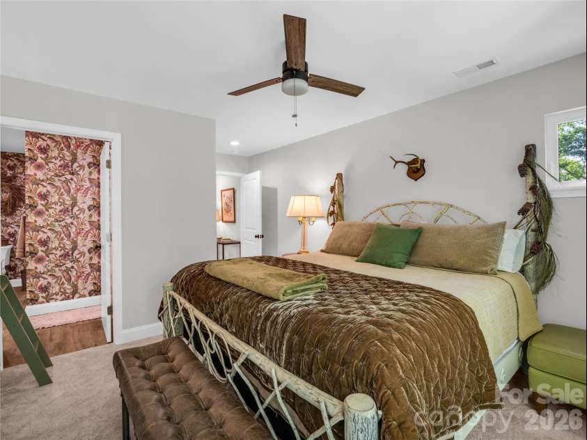 737 Melrose Mountain Road, Tryon, NC 28782.  MLS# CAR4380872, YatesRealty ID 24564. Second Floor Primary with Bunk Bed area and Ensuite Bath