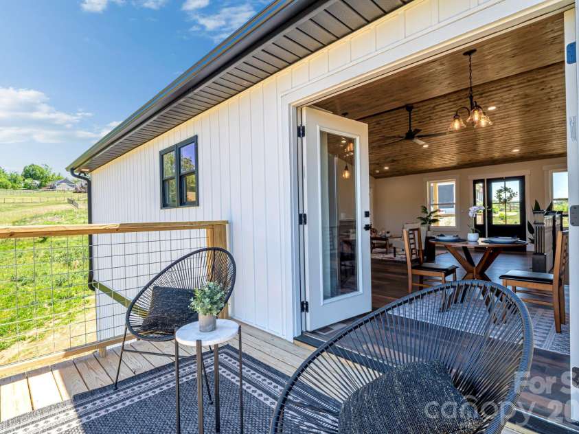 33 Pilgrims Path Lane, Alexander, NC 28701.  MLS# CAR4374090, YatesRealty ID 24567. Back deck
