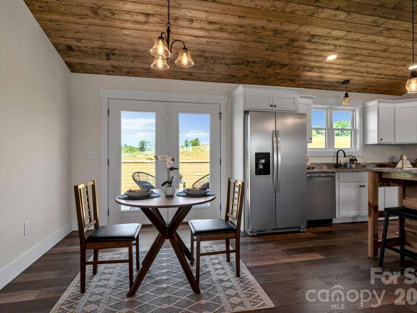 33 Pilgrims Path Lane, Alexander, NC 28701.  MLS# CAR4374090, YatesRealty ID 24567. Dining area