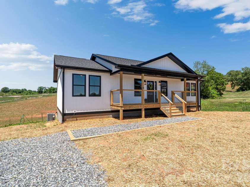 33 Pilgrims Path Lane, Alexander, NC 28701.  MLS# CAR4374090, YatesRealty ID 24567. Front of Home