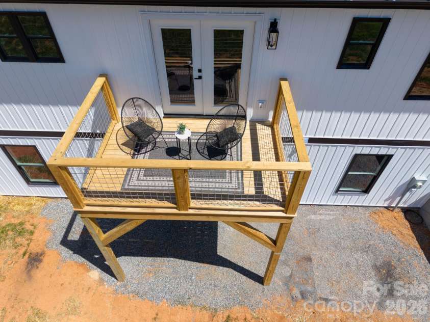 33 Pilgrims Path Lane, Alexander, NC 28701.  MLS# CAR4374090, YatesRealty ID 24567. Overview of back deck