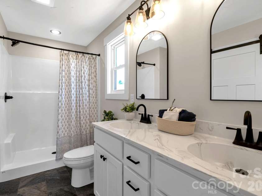 33 Pilgrims Path Lane, Alexander, NC 28701.  MLS# CAR4374090, YatesRealty ID 24567. Primary Bath w/double vanity